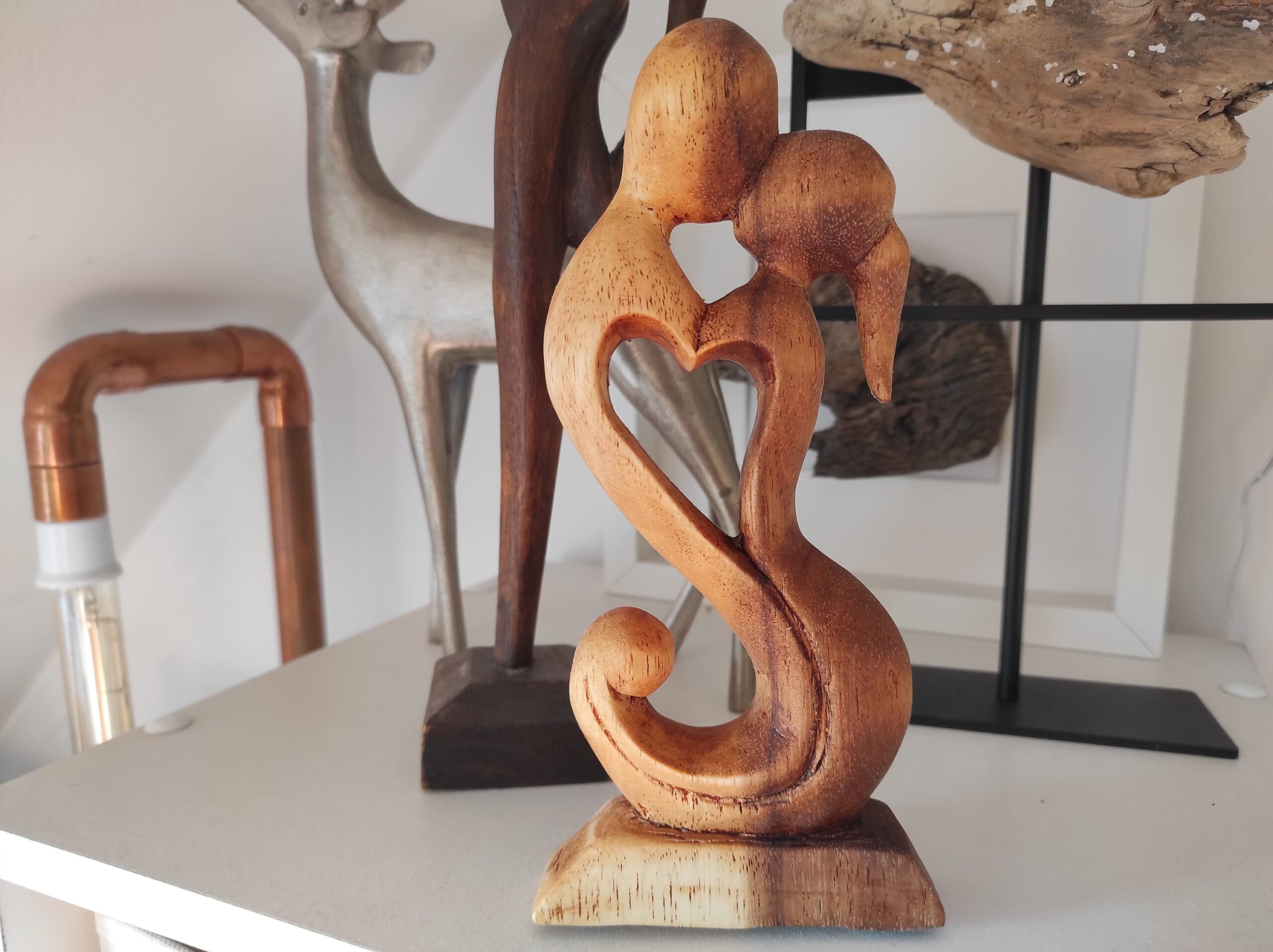 Crafted with Love: Unveiling the Timeless Artistry of the Handmade Wooden Couple Kissing Statue